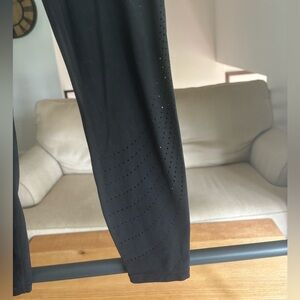 Athleta laser cut leggings, black size small.